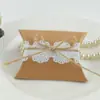Caixa de doces criativa caixa de presente caixa de embalagem de renda caixa tipo travesseiro de couro cru caixa de doces branca nude caixa de embalagem de papel Kraft