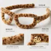 Elegante faixa de cabeça com estampa de leopardo para mulheres, moderna e estilosa, faixa de cabeça com alta pressão no topo da cabeça, acessório de cabelo versátil para sair