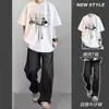 Conjunto de manga corta de alta gama para hombre, verano, camiseta americana moderna combinada con jeans rebeldes y guapos, conjunto de dos piezas de verano para hombre