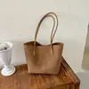 Bolso de mujer con patrón tejido retro de nicho, nuevo modelo de otoño 2026, bolso tote de alta gama para el día a día, bolso de hombro de gran capacidad