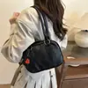 2025 Nuevo Bolso Pequeño Retro Versátil Bolso Bowling Diseño de Nicho Bolso de Hombro Cruzado para Mujer
