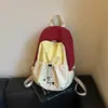 Mochila de nicho muito estilosa para meninas, novo modelo 2026, mochila escolar versátil com color blocking para alunos do ensino fundamental II e universitários