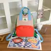 Bolsa Infantil Estilo Coreano Nuevo Bloques de Color Dopamina Doble Hombro Nicho Parche de Letras Colores Patchwork Multifuncional Mini Mochila Mochila Escolar