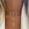 Joyería Europea y Americana Nuevo Retro Ojo Turco Colgante de Palma Collar de Doble Capa Personalizado Versátil Accesorios de Alta Gama