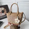 Bolsa feminina transfronteiriça 2026 nova moda versátil brilhante bordado pesado bolsa de mão Lady Dior bolsa de ombro transversal com fita