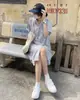 Vestido de verano de algodón estilo camisa, holgado, simple, fresco, de un solo botón, arrugado