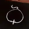 Pulsera de cordón con colgante de cruz de circonita, sensación de lujo ligero de alta gama, diseño de nicho a la moda, accesorio de mano único