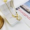Collar 2022 nuevo creativo de acero de titanio dorado con incrustaciones de concha para mujer, cadena cuadrada para clavícula, joyería de sonrisa pequeña y fresca al por mayor