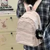 Mochila casual minimalista estilo japonés nueva para niñas, adecuada para compras diarias y ocio, ofreciendo un ambiente fresco y relajado.