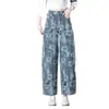 Pantalones vaqueros de estilo pintura al óleo artística con estampado retro Shui Fu 2026 Otoño Nuevos de Cintura Alta Sueltos Pierna Ancha Plátano