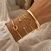 Conjunto de Quatro Pulseiras Abertas Estilo Punk Transfronteiriço Europeu e Americano Nó de Coração Brilhante em Metal Pulseiras Criativas