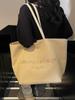 Bolsa Tote de Lona Casual de Grande Capacidade com Letras para Mulheres 2025 Novo Estilo Roupa de Trabalho Simples para o Trabalho Bolsa de Ombro de Alto Valor