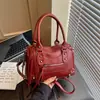 Bolso de Mano Casual Elegante de Nicho Bolso Almohada para Mujer Moda Nueva Primavera 2026 Bolso de Hombro Cruzado con Textura de Alta Calidad