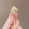 Novo broche estilo antigo de alta qualidade ins para mulheres estilo chinês leque borla pino de terno placket de pressão cheongsam corsage atacado