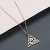 Nuevo collar de moda europea y americana, collar de flor de triángulo hueco, comercio exterior AliExpress ebay suministro