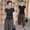 Traje de Moda Personalizado para Mulheres Verão 2026 Novo Elegante Emagrecedor Simples Top de Manga Curta Calça de Perna Larga Poá