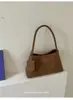 Bolso Femenino para Axila 2026 Nuevo de Moda Otoño Vintage Nicho Patrón Tejido Bolso de Hombro para el Trabajo y los Viajes Bolso Cubo