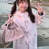 Abrigo de lana rosa para mujer, venta al por mayor transfronteriza de otoño e invierno, elegante abrigo de lana de longitud media estilo coreano con lazo de alta gama