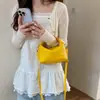 Bolsos retro populares para mujer de este año, nuevo modelo 2026, bolso de hombro casual simple, bolso cruzado versátil para mujer, transfronterizo