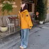 Moda Casual Nueva de Otoño 2026 Reductora de Edad Adelgazante Simple Elegante Naranja Estilo Ropa de Trabajo Chaqueta Cortavientos