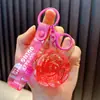 Llavero de Flor de Rosa de Arena Líquida Colgante de Mochila para Estudiante Llavero de Coche Máquina de Garra Regalo Pequeño