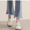 Mocassins femininos em couro macio estilo francês, novo modelo outono 2026, sapatos rasos sem cadarço para o dia a dia com solas macias