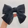 Coreano ins Nuevo lazo de textura sedosa pinza de resorte para el cabello Super hada niña pinza superior accesorios para el cabello de boutique