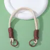 Lanyard colorido simples para celular com fivela dupla, chaveiro pingente em blocos de cor trançado à mão, cordão de poliéster anti-perda, disponível para atacado