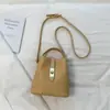 Bolsa Balde Portátil Xiaomi Moda Coreana Estilosa para Mulheres Verão 2026 Nova Pequena de Nicho Simples Casual Bolsa de Ombro Transversal
