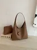 Bolso de hombro único con textura tejida transfronterizo para mujer 2026 nuevo versátil de gran capacidad para debajo del brazo bolso tote casual para el día a día moderno
