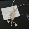 Collar Largo con Borla de Estrella Plateada Dulce y Fresco Diseño de Nicho para Mujer Cadena de Suéter Personalizada Accesorios Retro Antiguos de Cuello Halter