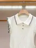 Shenzhen Nanyou Ropa de Mujer de Gama Alta Verano Nuevo Estilo Universitario Coreano Reductor de Edad en Línea Top de Punto con Bloques de Color y Mangas de Volantes