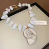 Collar de doble capa con cuentas acrílicas transfronterizo europeo y americano, cadena para la clavícula de lujo ligero de alta gama, joyería de estilo étnico vintage al por mayor