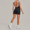 Ropa de yoga aéreo al por mayor transfronteriza, traje de una pieza color block cepillado con diseño de espalda hueca, ropa adelgazante para Pilates y fitness, disponible para dropshipping