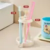 Estante de almacenamiento para artículos de tocador, vaso para enjuague bucal y soporte para cepillo de dientes, base de almacenamiento de cepillos de dientes a prueba de polvo y con drenaje de agua para lavabo de baño