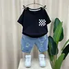 Roupa de Verão para Meninos 2022 Nova Tendência Bebê Celebridade da Internet Roupas de Verão Crianças Frescas Manga Curta Conjunto de Duas Peças Moda