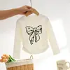 Camiseta de manga larga para niños 2026, estilo coreano, primavera y otoño, para niñas, tallas pequeñas y medianas, cuello redondo, diseño color block, mangas raglán, top versátil para usar como capa base