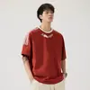 Top com padrão de losangos, novo estilo verão 2026, fresco e solto, estampado, gola redonda, manga curta, camiseta masculina versátil e moderna