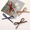 Otoño e Invierno Retro Versátil Hecho a Mano Gamuza Lazo DIY Pasador Pinza Lateral Accesorio para el Cabello Zapato Calcetín Bolsa Colgante Accesorio
