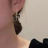 Pendientes de lujo con diseño de nicho coreano, con lazo negro y aguja de plata S925, nuevos y elegantes pendientes retro de moda para mujer.