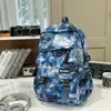 Mochila Escolar Transfronteiriça Nova para Aluno do Ensino Fundamental Feminina Ins Nicho Simples Versátil Grande Capacidade Tendência Cool Mochila Masculina