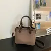 Bolso de hombro retro de nicho estilo coreano para mujer 2026, bolso cruzado de moda, bolso tote simple y elegante para el día a día y para ir al trabajo