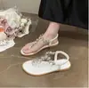 Sandalias Romanas para Mujer, Verano 2026 Nuevas Versátiles Estilo Hada Elegantes Planas Chanclas de Pedrería Zapatos de Playa