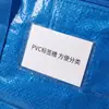 Bolsa de embalaje exclusiva para mudanzas transfronterizas hecha de material PP, bolsa plegable para almacenamiento de ropa, bolsa grande de almacenamiento para equipaje de mudanza