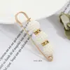 Accesorios para broches de cintura, ropa fija, cambio de cintura, pequeño artefacto, hebilla de cintura, broche anti-corrimiento, hebilla para pantalones de mujer.