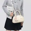 Bolsas de Design de Nicho de Luxo para Mulheres Verão 2026 Nova Tendência Versátil Bolsa de Mão Ombro Único Transversal Bolsa de Pudim