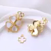 Nuevos Accesorios de Perlas DIY Flor de Trébol de Cuatro Hojas Zirconia Chapado en Cobre Oro Real Hebilla de Conexión para Cadena de Suéter Pulsera