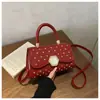 Textura de Remache Tachonado 2026 Color Sólido Hebilla de Cierre Simple y Elegante Nuevo Estilo de Primavera Bolso de Hombro Cruzado Pequeño Cuadrado