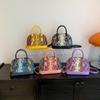 Bolsa de concha portátil da moda para mulheres 2023 Verão novo padrão de cor contrastante ombro único transversal casual simples bolsa para o dia a dia