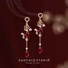 Pendientes de Perlas con Lazo Rojo para Otoño e Invierno Pendientes de Alta Gama para Mujer 2025 Nuevo Estilo Chino Pendientes Rojos